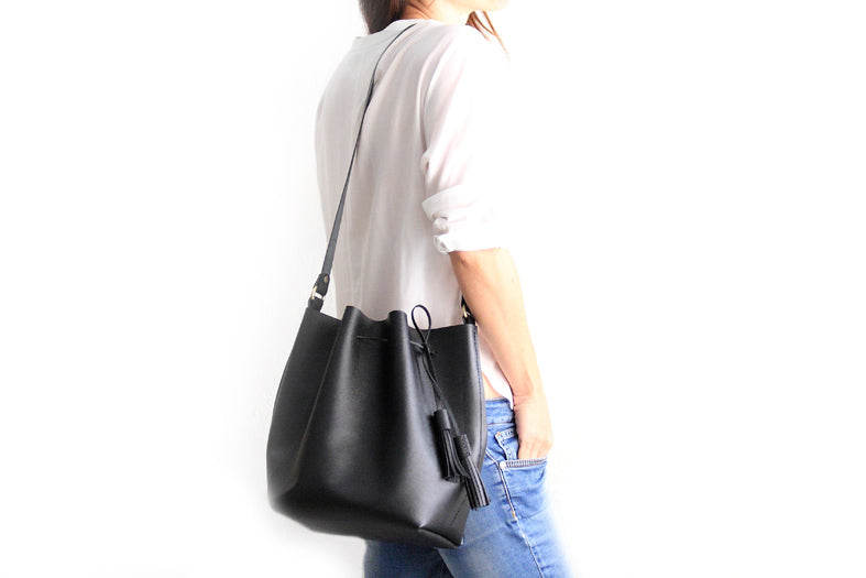 Bucket bag, shoulder bag made of saffiano printed leather, black color. Chiara leather bucket bag