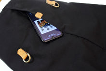 Load image into Gallery viewer, Cleo CONVERTIBLE BACKPACK in bag, canvas and leather backpack, Black color.