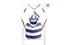 Load image into Gallery viewer, Cleo CONVERTIBLE BACKPACK in bag, canvas and leather backpack, Striped Blue color.